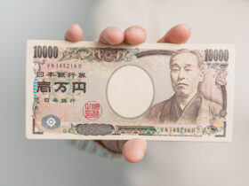 hand holding japanese yen banknote stack thousand 2023 11 27 05 19 02 utc
