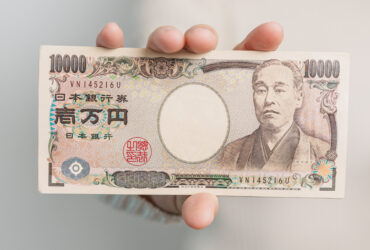 hand holding japanese yen banknote stack thousand 2023 11 27 05 19 02 utc